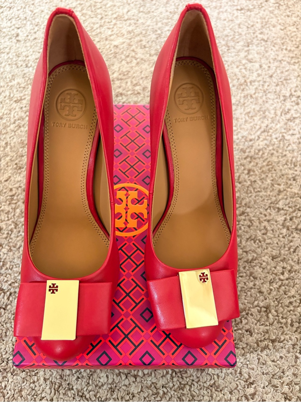 Tory Burch Red Leather Bow Pumps with Gold Plaque